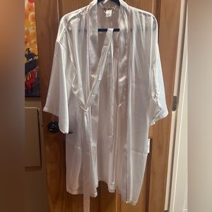 NWT Never been worn, bride robe with pink detail, satin feel.